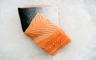 Two fresh cuts of wild caught salmon.